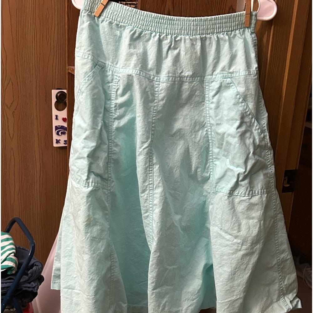Women’s vintage skirt. Beautiful teal color. Never worn.